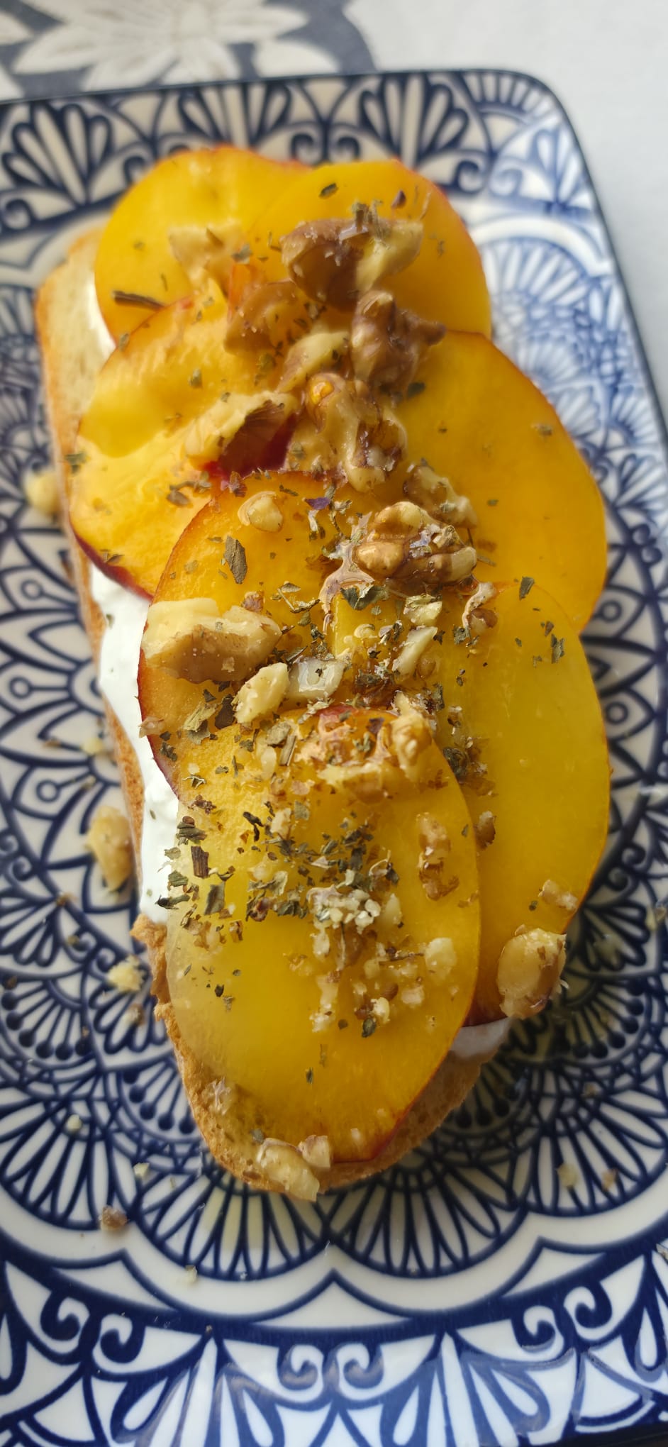 Peach burrata toast with honey, walnuts and mint from the Recipes by the Eye kitchen test.